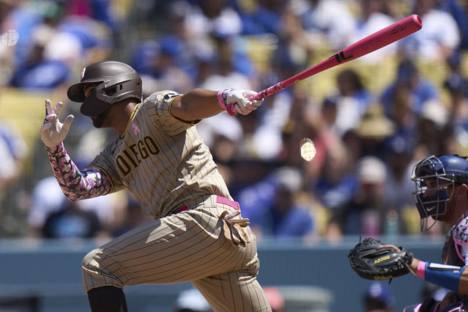 San Diego Padres' Xander Bogaerts grounds out to Los Angeles Dodgers shortstop Miguel Rojas during the fourth inning of a baseball game Sunday, May 14, 2023, in Los Angeles. (AP Photo/Allison Dinner)