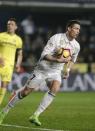 Football Soccer - Villarreal v Real Madrid - Spanish La Liga Santander - Ceramica Stadium, Villarreal, Spain, 26/02/17 Real Madrid's Cristiano Ronaldo picks up the ball after scoring a goal from the penalty spot. REUTERS/Heino Kalis