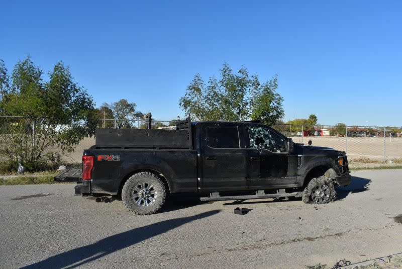 A bullet-riddled pick up truck is pictured after clashes sparked by suspected cartel gunmen in a northern Mexican town killed 20 people this weekend in Villa Union