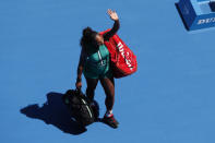 Tennis - Australian Open - Quarter-final - Melbourne Park, Melbourne, Australia, January 23, 2019. Serena Williams of the U.S. waves to the crowd as she exits the court after losing the match to Czech Republic's Karolina Pliskova. REUTERS/Kim Kyung-Hoon