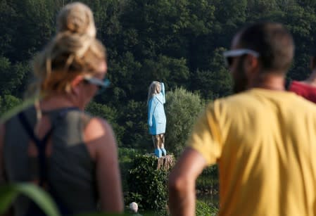 Life-size wooden sculpture of U.S. first lady Melania Trump is officially unveiled in Rozno, near her hometown of Sevnica