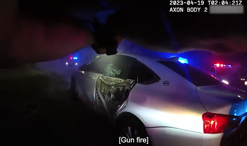 An image from a Jacksonville sheriff's officer's body camera video shows police returning fire on Jeffrey Alan Martin after another officer was shot outside Baptist Medical Center on April 18.