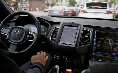 Uber driverless car - Credit: AP