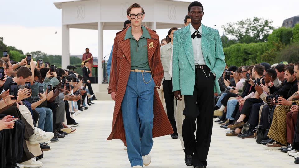 Amiri showed a collection featuring formal tuxedos with dégradé beadings were fused with slouchier lines and flared pants as a nod to skate culture or elevated with crystal-pinstripes. - Pascal Le Segretain/Getty Images