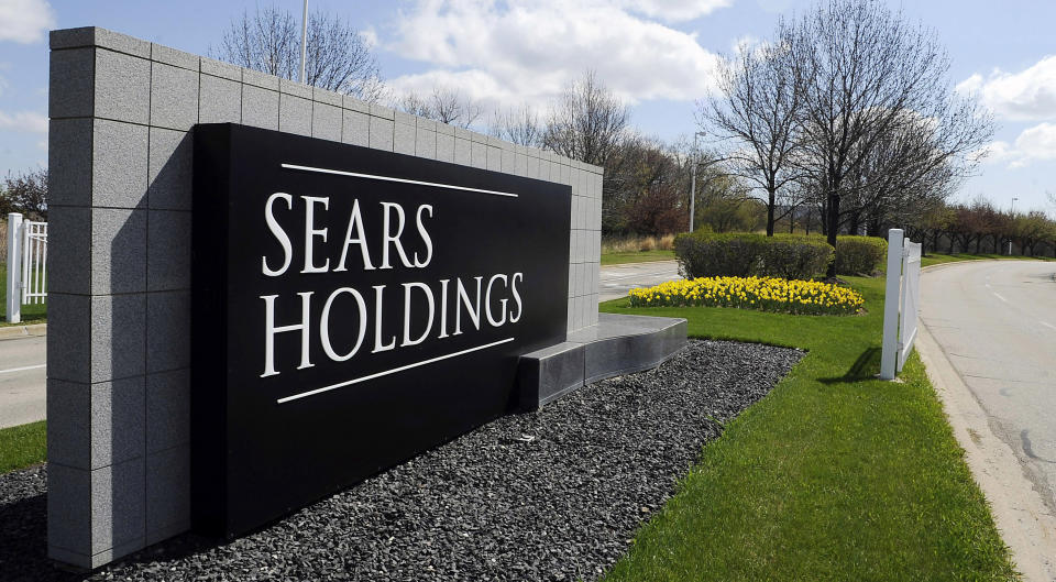 FILE - A May 4, 2011 file photo shows the entrance to the Sears Holdings Corp. Prairie Stone campus area in Hoffman Estates, Ill. Most states are doing a poor job tracking whether their tax breaks for businesses are actually spurring job growth, including some that have poured hundreds of millions of dollars into corporate incentive programs even while grappling with record deficits, according to a new report released Thursday, April 12, 2012 by the Pew Center on the States. Late last year Illinois agreed to a package of $330 million in tax breaks for Sears Holding Corp. and two companies that operate Chicago financial exchanges after they threatened to leave the state. (AP Photo/Daily Herald, Mark Welsh, File) MANDATORY CREDIT, MAGS OUT, TV OUT