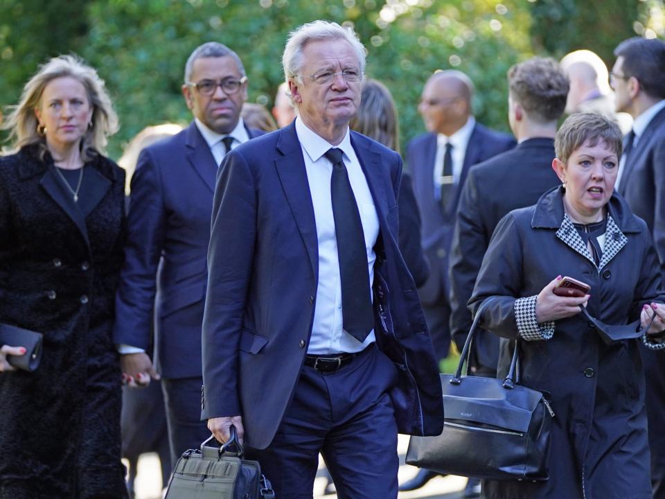 Tory MP David Davis (centre) arrives for the funeral of James Brokenshire at St John The Evangelist church in Bexley, southeast London, on Thursday (PA)