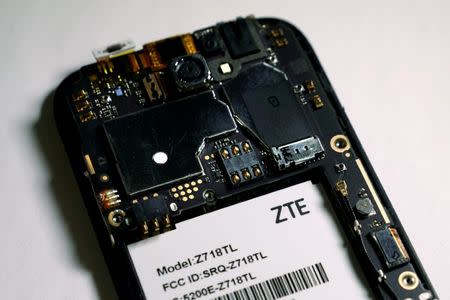 FILE PHOTO: The inside of a ZTE smart phone is pictured in this illustration taken April 17, 2018. REUTERS/Carlo Allegri/Illustration/File Photo