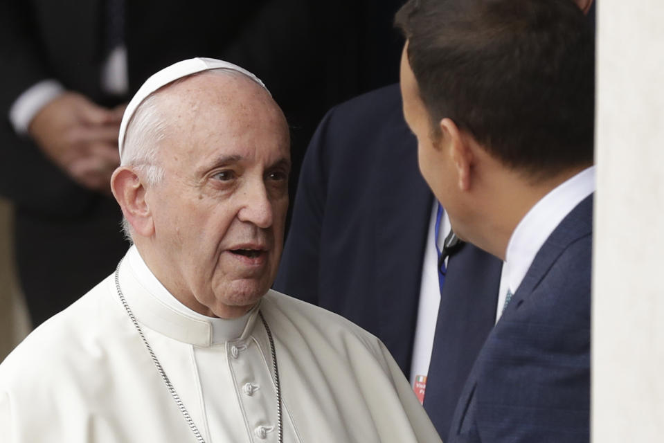 Pope Francis meets with Irish Prime Minister Leo Varadkar, right, as he arrives at Dublin Castle, Ireland, Saturday, Aug. 25, 2018. Pope Francis is on a two-day visit to Ireland. (AP Photo/Matt Dunham)