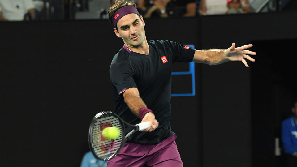 Roger Federer, pictured here in action against Novak Djokovic at the 2020 Australian Open.