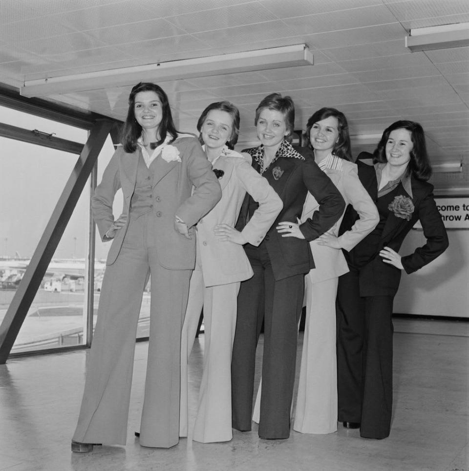 The Nolan sisters pose together at London Heathrow Airport