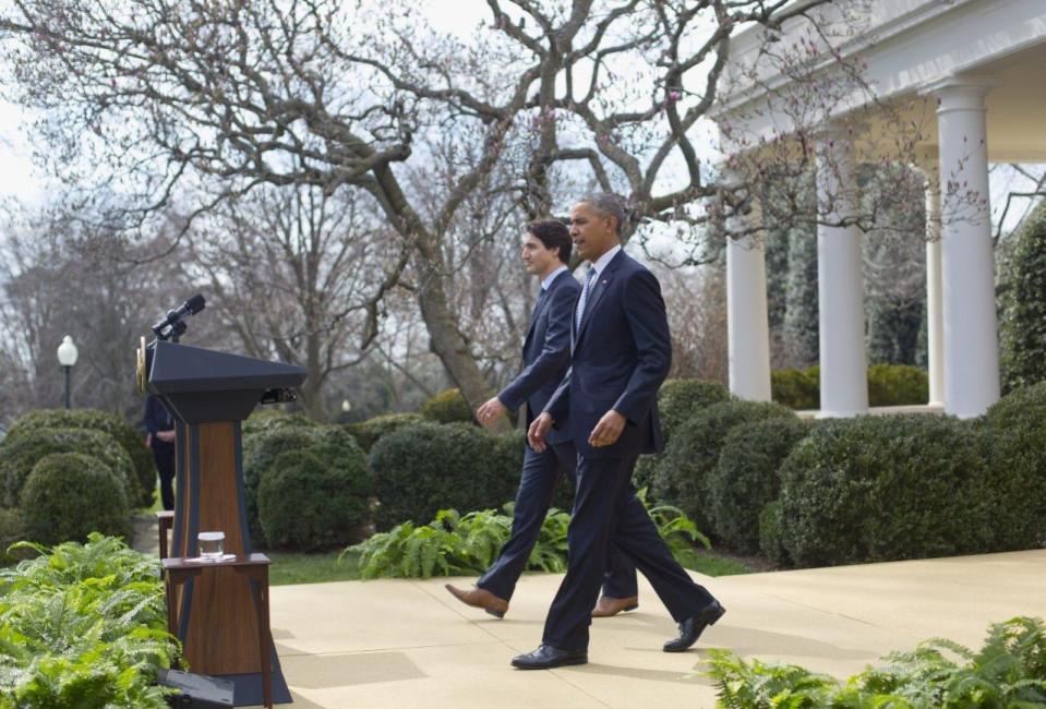 President Barack Obama and Prime Minister Justin Trudeau walk out together before their joint news conference, Thursday, March 10, 2016, in the Rose Garden of the White House in Washington. (AP Photo/Pablo Martinez Monsivais)