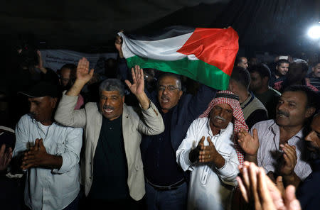 People celebrate after Israel delays eviction of the Palestinian Bedouin village of Khan al-Ahmar, in the occupied West Bank October 20, 2018. REUTERS/Mohamad Torokman