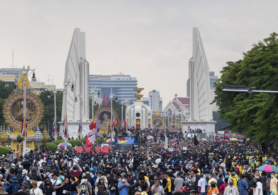 Anti-government protesters preparing to march from Democracy Monument to government house in Bangkok, Thailand, Wednesday, Oct. 14, 2020. Anti-government protesters began gathering Wednesday for a planned rally at Bangkok's Democracy Monument being held on the anniversary of a 1973 popular uprising that led to the ousting of a military dictatorship, amid a heavy police presence and fear of clashes with political opponents. (AP Photo/Sakchai Lalit)