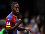 Wilfried Zaha signs new five-year contract with Crystal Palace after choosing not to pursue summer transfer