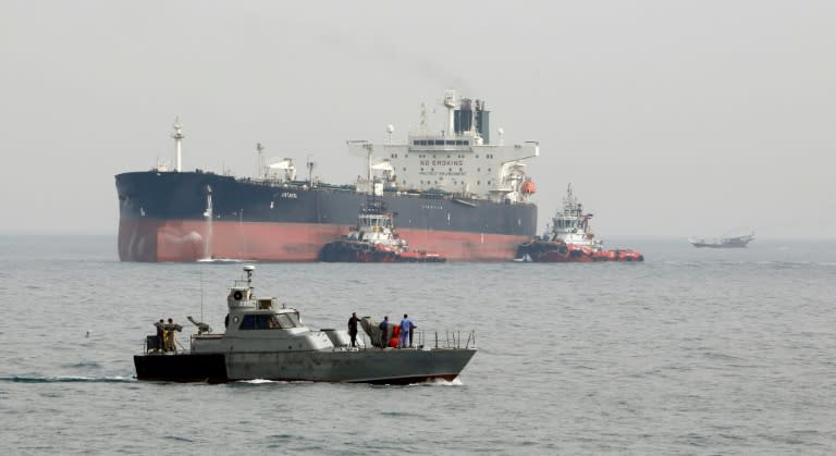 A tanker prepares to dock at an oil facility on the Iranian island of Khark on March 12, 2017