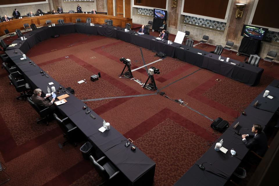 With senators practicing social distancing Justin Walker testifies before a Senate Judiciary Committee hearing on his nomination to be a U.S. circuit judge for the District of Columbia Circuit on Capitol Hill in Washington, Wednesday, May 6, 2020.