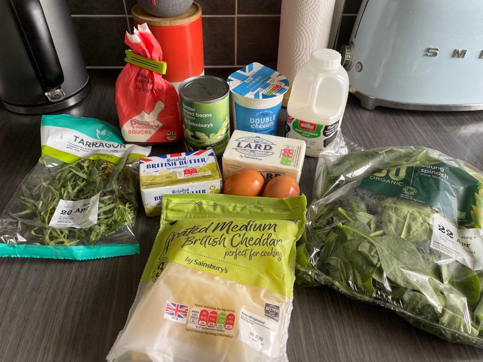 A stash of ingredients on a kitchen counter, for making coronation quiche.