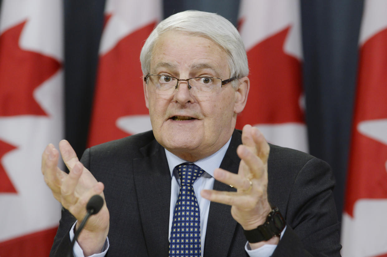 Canada's Transport Minister Marc Garneau speaks about the grounding of all Boeing 737 Max 8 airplanes in Canada during a press conference in Ottawa, Ontario on Wednesday, March 13, 2019. Canada becomes the latest country to bar the Boeing 737 Max as the investigation into the latest crash, the second in just over five months, is underway. (Adrian Wyld/The Canadian Press via AP)