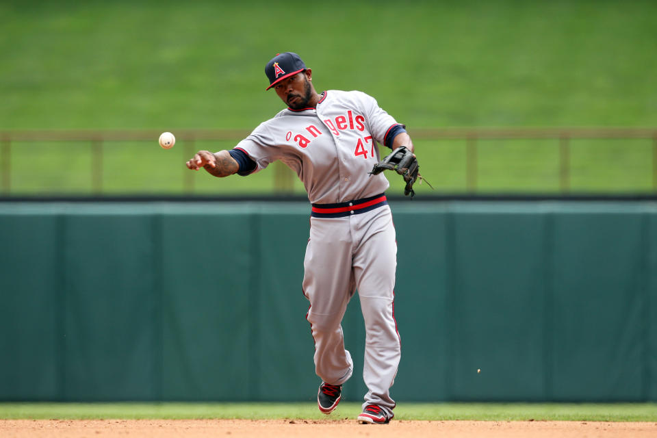 ARLINGTON, TX - MAY 12: Howie Kendrick #47 of the Los Angeles Angels of Anaheim throws out a Texas Rangers runner on May 12, 2012 in Arlington, Texas. (Photo by Layne Murdoch/Getty Images)