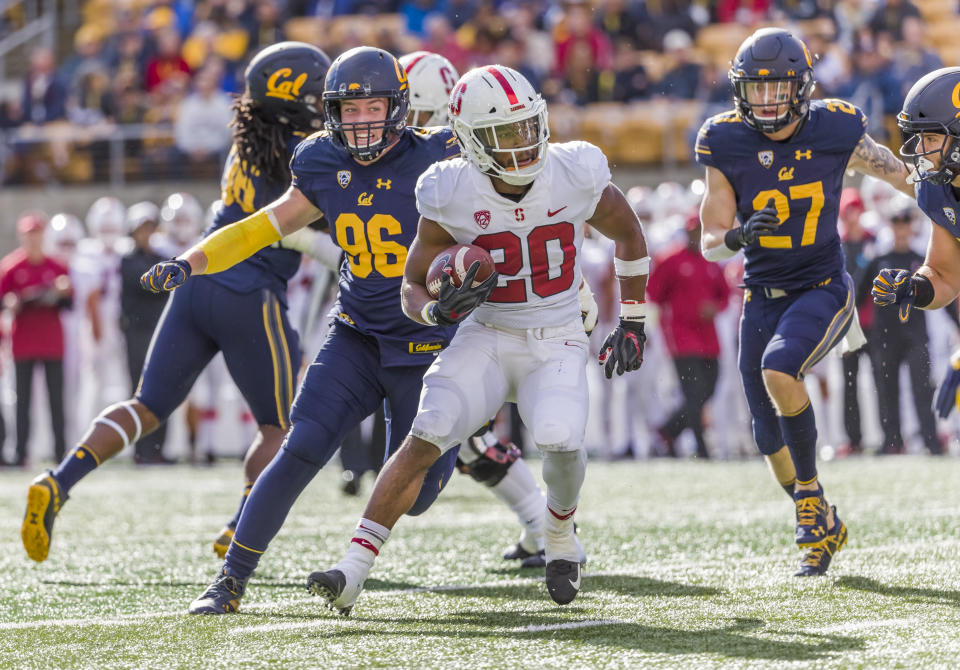 Bryce Love #20 of the Stanford Cardinal runs for yardage during the 121st Big Game between Stanford and California. (Photo by David Madison/Getty Images)