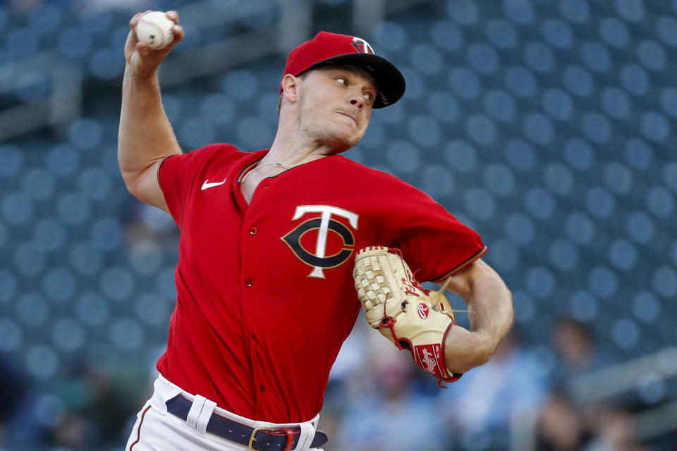 Minnesota Twins starting pitcher Sonny Gray throws to a Cleveland Guardians batter during the first inning of a baseball game Friday, May 13, 2022, in Minneapolis. (AP Photo/Bruce Kluckhohn)