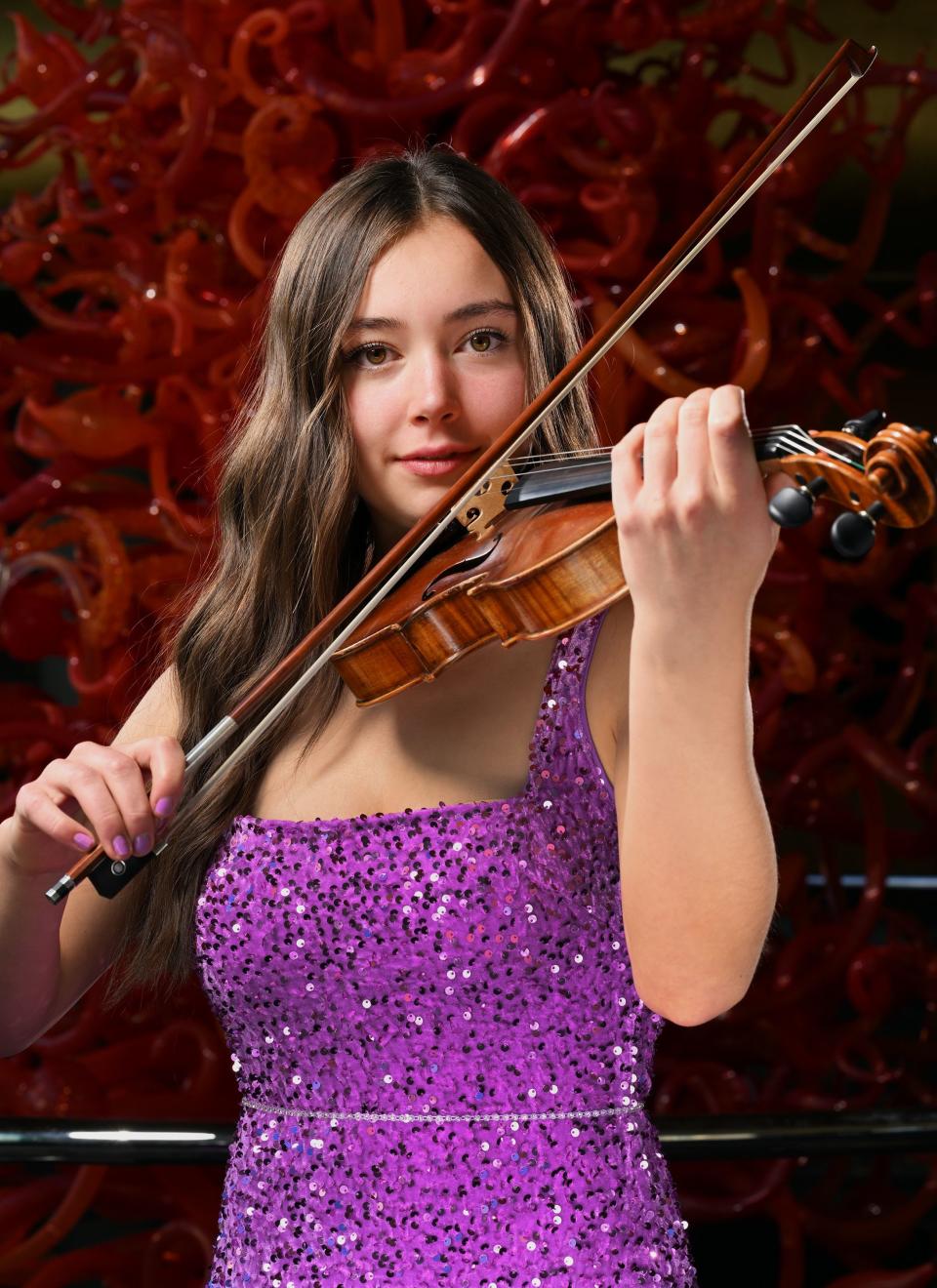 Alina Baron, violinist, poses for photos for the 2023 Salute to Youth Portraits at Abravanel Hall in Salt Lake City on Wednesday, Oct. 4, 2023. | Scott G Winterton, Deseret News