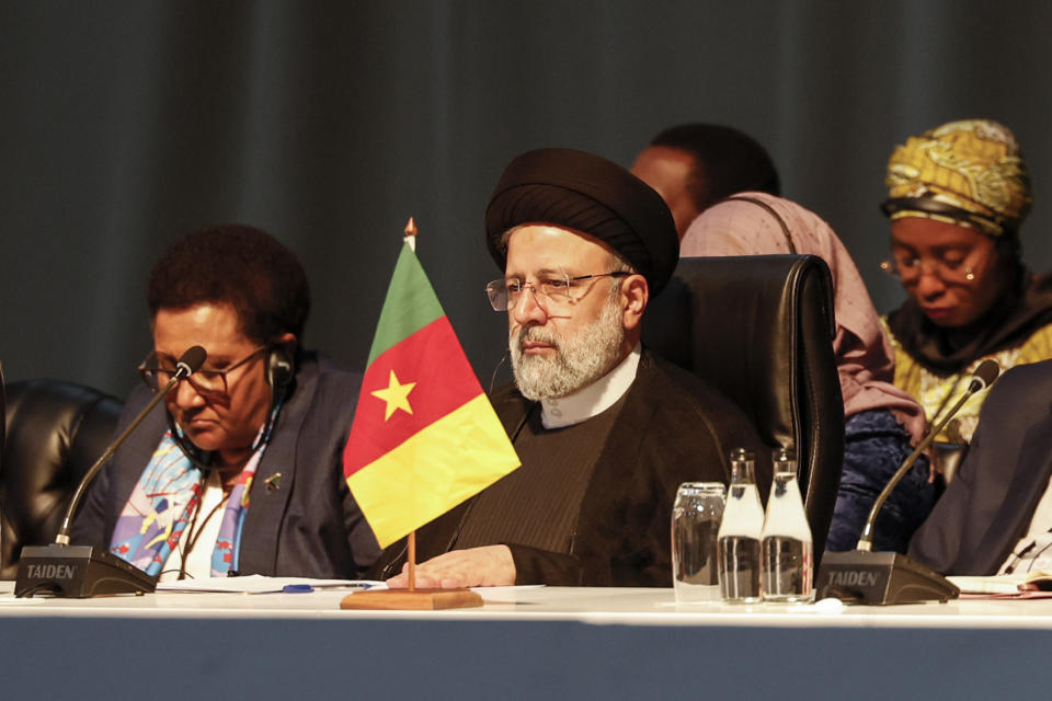 Iranian President Ebrahim Raisi, centre, attends a meeting during the 2023 BRICS Summit at the Sandton Convention Centre in Johannesburg Thursday, Aug. 24, 2023. (Marco Longari/Pool via AP)