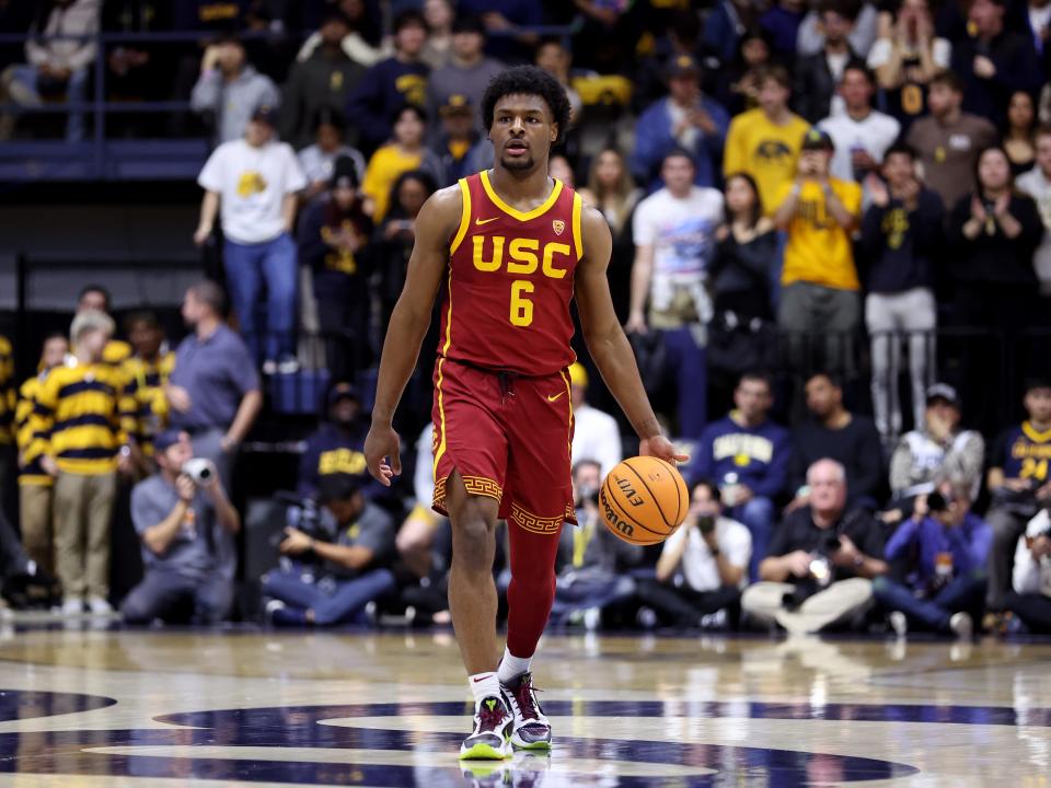 USC basketball player Bronny James dribbles in a game against UC Berkeley in February 2024.