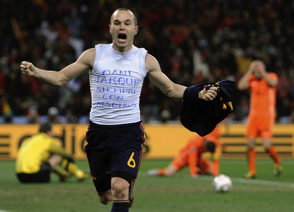 FILE - Spain's Andres Iniesta celebrates after scoring the only goal in the World Cup final soccer match against the Netherlands at Soccer City in Johannesburg, South Africa on July 11, 2010. (AP Photo/Martin Meissner, File)