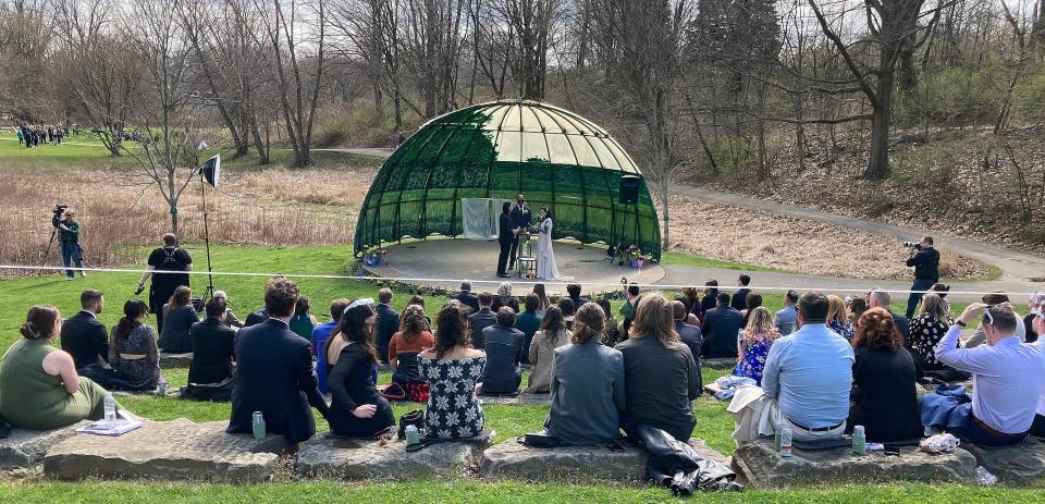 As crowds gathered throughout Erie's Frontier Park minutes before the total solar eclipse on Monday, Philadelphia residents Hannah Gaudite and Luis Gongora got married in the park's amphitheater. The couple planned for their nuptials to coincide with the eclipse in Erie, the only major Pennsylvania city in the "path of totality" for the celestial event.