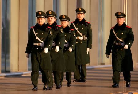 Paramilitary police officers are seen before senior North Korean official Kim Yong Chol's arrival at the international airport for a flight to Washington from Beijing, China January 17, 2019. REUTERS/Jason Lee