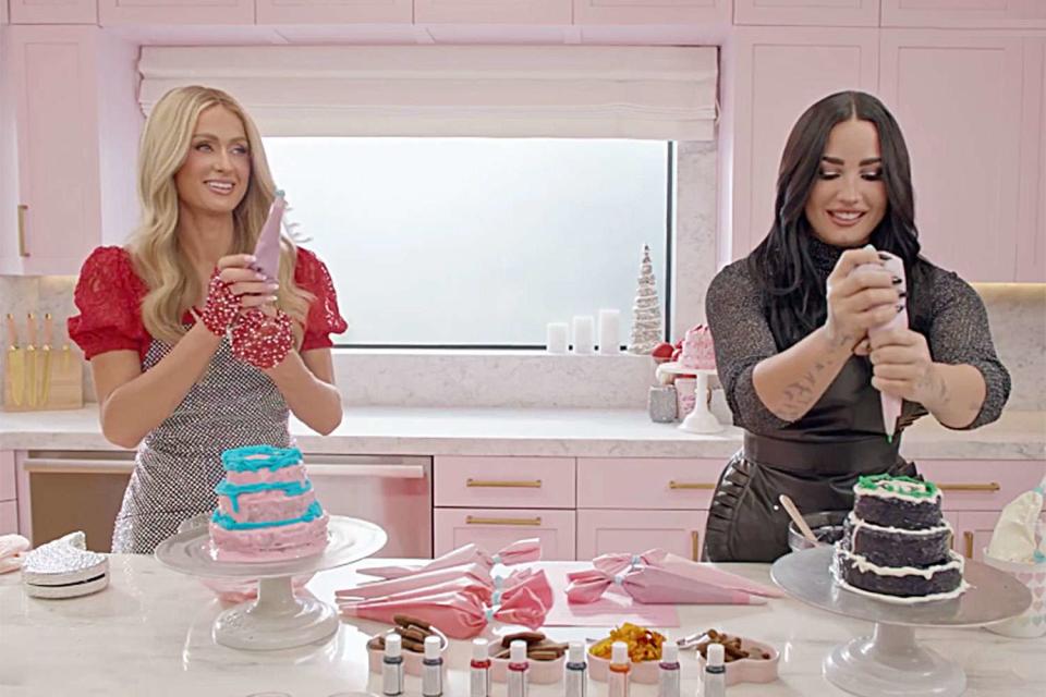 <p>The Roku Channel</p> Paris Hilton and Demi Lovato making pet-friendly dog cakes for The Roku Channel