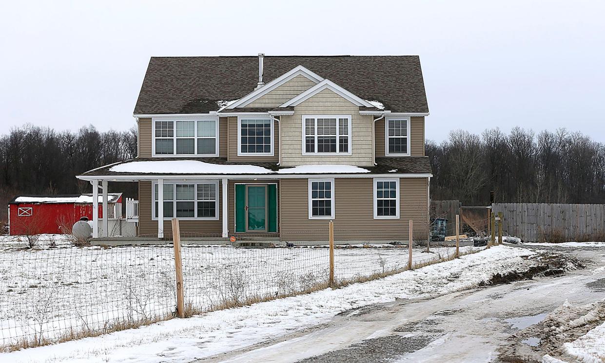 Authorities are investigating after a man was found dead Friday afternoon in this Orange Township house. Kurtis Harstine, 41, was shot and had been dead 'for some time.'