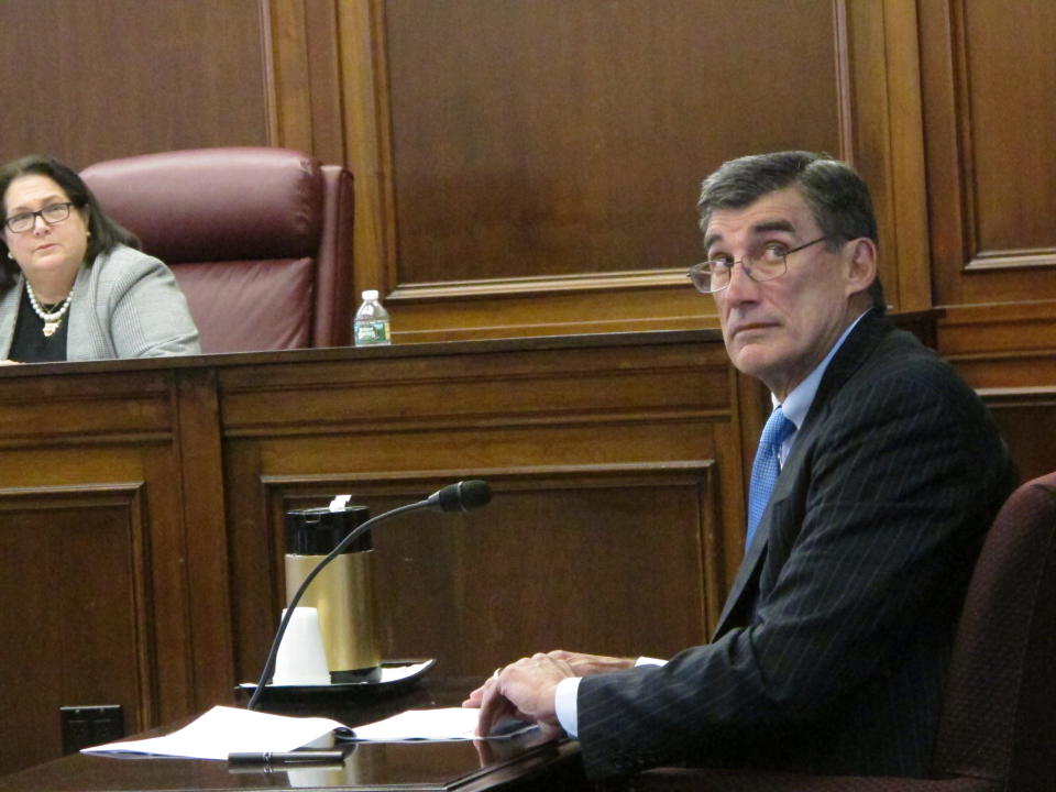 Gary Carano, chairman and CEO of Eldorado Resorts, testifies Wednesday, Sept. 12, 2018, before the New Jersey Casino Control Commission in Atlantic City, N.J. about the company's plans for the Tropicana casino in Atlantic City, which it is in the process of buying. (AP Photo/Wayne Parry)