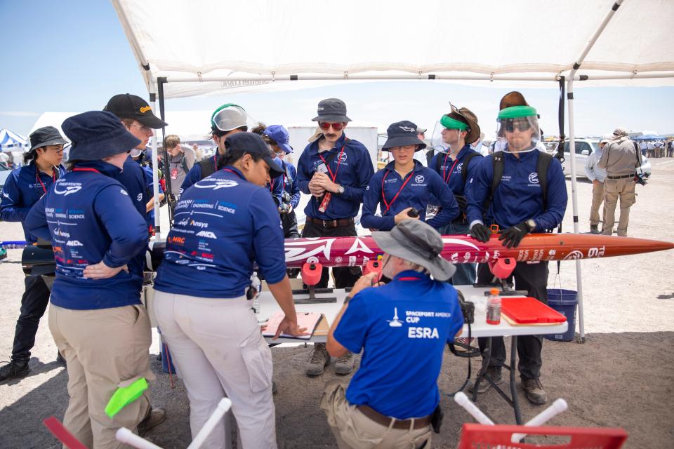 A team preps their rocket for launch during the Spaceport America Cup on Friday, June 21, 2023, at Spaceport America. 