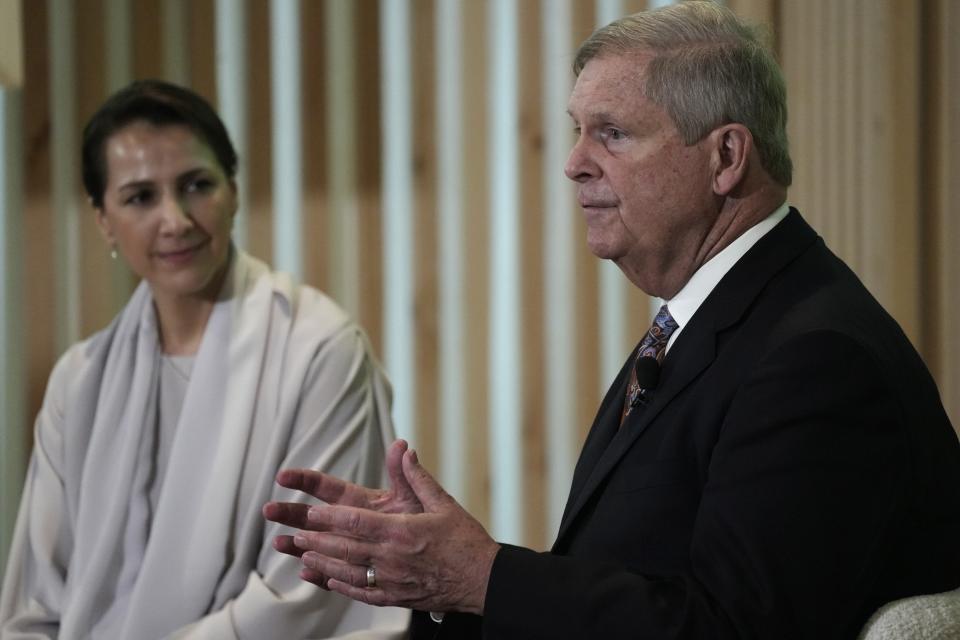 Agriculture Secretary Tom Vilsack, right, speaks next to Mariam Almheiri, United Arab Emirates Minister of Climate Change and Environment, during a session at the COP28 U.N. Climate Summit, Friday, Dec. 8, 2023, in Dubai, United Arab Emirates. (AP Photo/Joshua A. Bickel)
