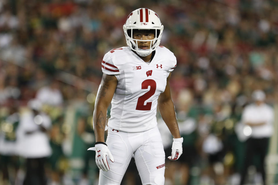 Wisconsin safety Reggie Pearson (2) waits for action during an NCAA football game on Friday, Aug. 30, 2019 in Tampa, Fla. Wisconsin has welcomed back offensive lineman Jon Dietzen and lost Pearson as it resumes practice to prepare for the pandemic-delayed season. The Badgers released a roster Wednesday, Sept. 23, 2020 that didn’t include Pearson but added Dietzen, who had announced in February 2019 that he was stepping away from football due to injuries.(AP Photo/Mark Lomoglio, file)