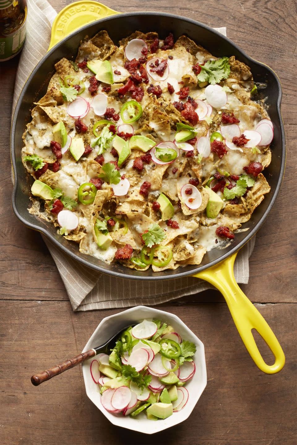 breakfast in bed chorizo chilaquiles in yellow skillet