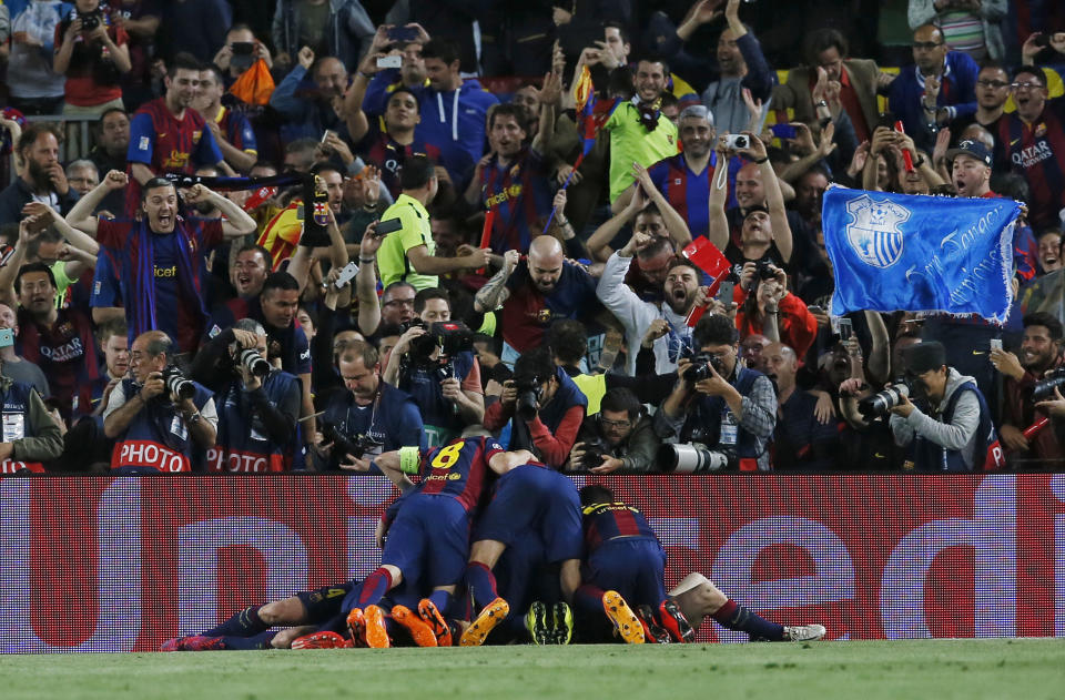 Football: Barcelona's Lionel Messi celebrates scoring their second goal with team mates