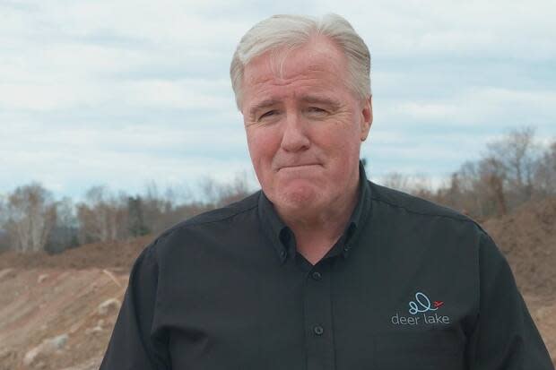 Deer Lake mayor Dean Ball stands on the construction site at the municipal RV Park and campground. He says the park should be open to the public sometime in June. (Colleen Connors/CBC - image credit)