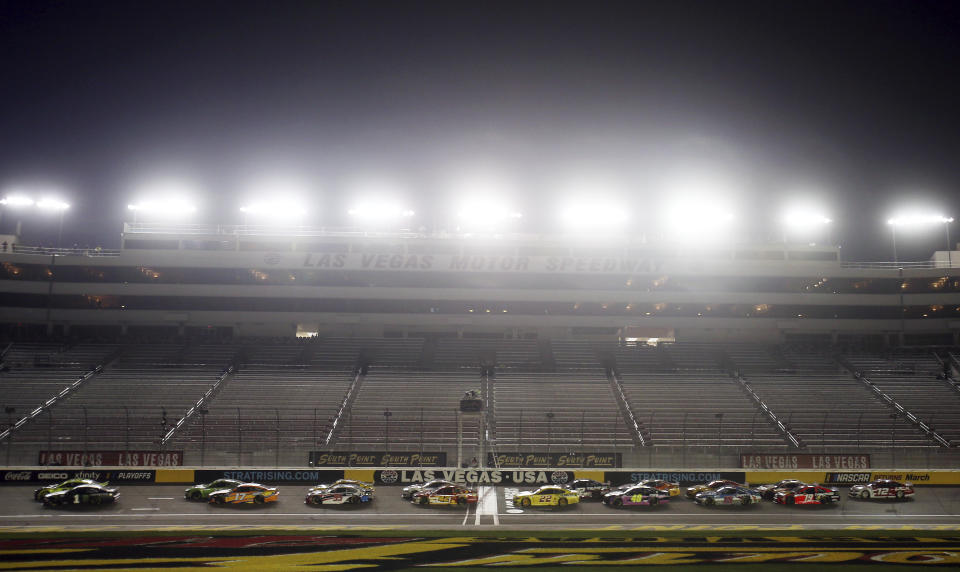 Kurt Busch (1) leads during a restart during a NASCAR Cup Series auto race, Sunday, Sept. 27, 2020, in Las Vegas. (AP Photo/Isaac Brekken)