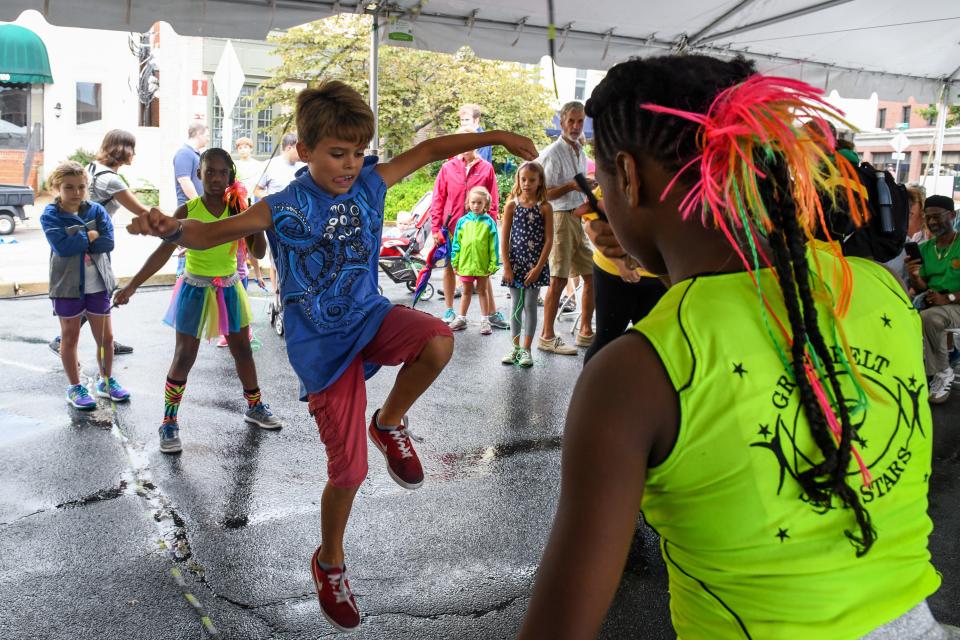 10-year-old Wyatt Tolker jumps rope with the Greenbelt S.I.T.Y Stars precision jumprope team at the National Folk Festival in Salisbury on Saturday, Sept. 8.