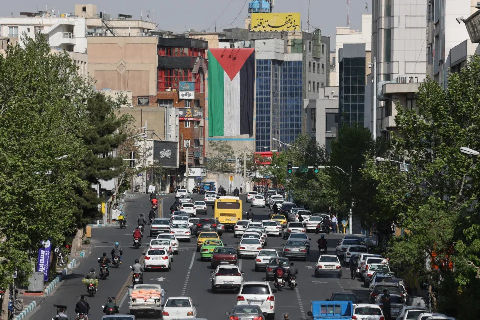 A huge Palestinian flag is seen draped on a building in Tehran, Iran, April 15, 2024. / Credit: Majid Asgaripour/WANA/REUTERS