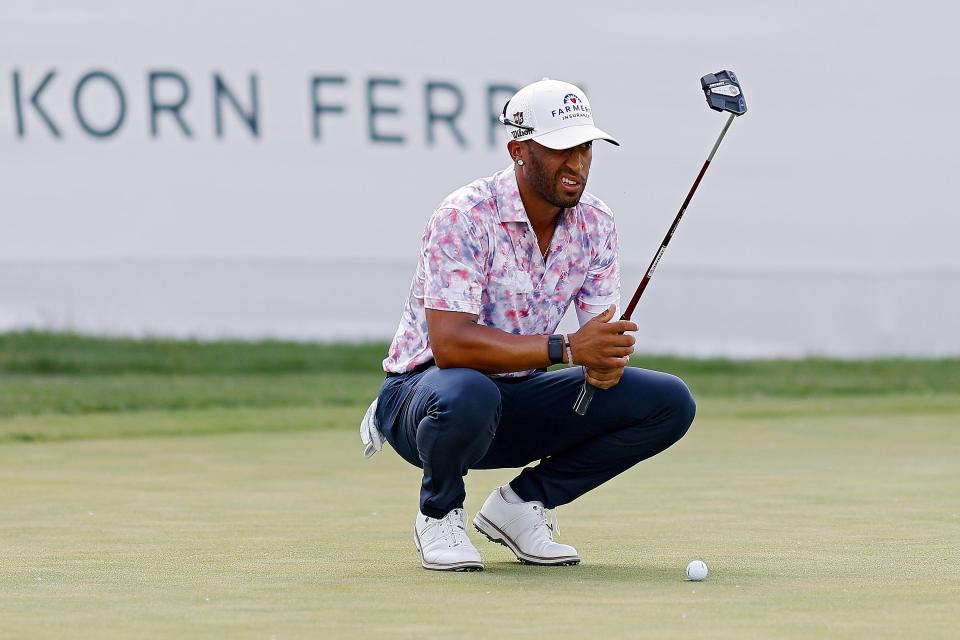 Willie Mack III looks over a putt on the 18th hole during the third round of the Blue Cross and Blue Shield of Kansas Wichita Open at Crestview Country Club on June 17, 2023 in Wichita, Kansas.