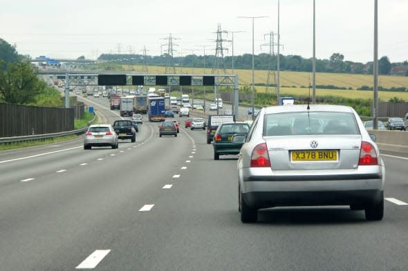 LONDON, UK - JULY 20: Heavy traffic on british motorway M1 on July 20, 2012, London, UK. The M1 is a north-south motorway in Eng