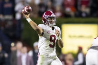 Alabama quarterback Bryce Young (9) throws during the second half of an NCAA college football game against Auburn, Saturday, Nov. 27, 2021, in Auburn, Ala. (AP Photo/Vasha Hunt)