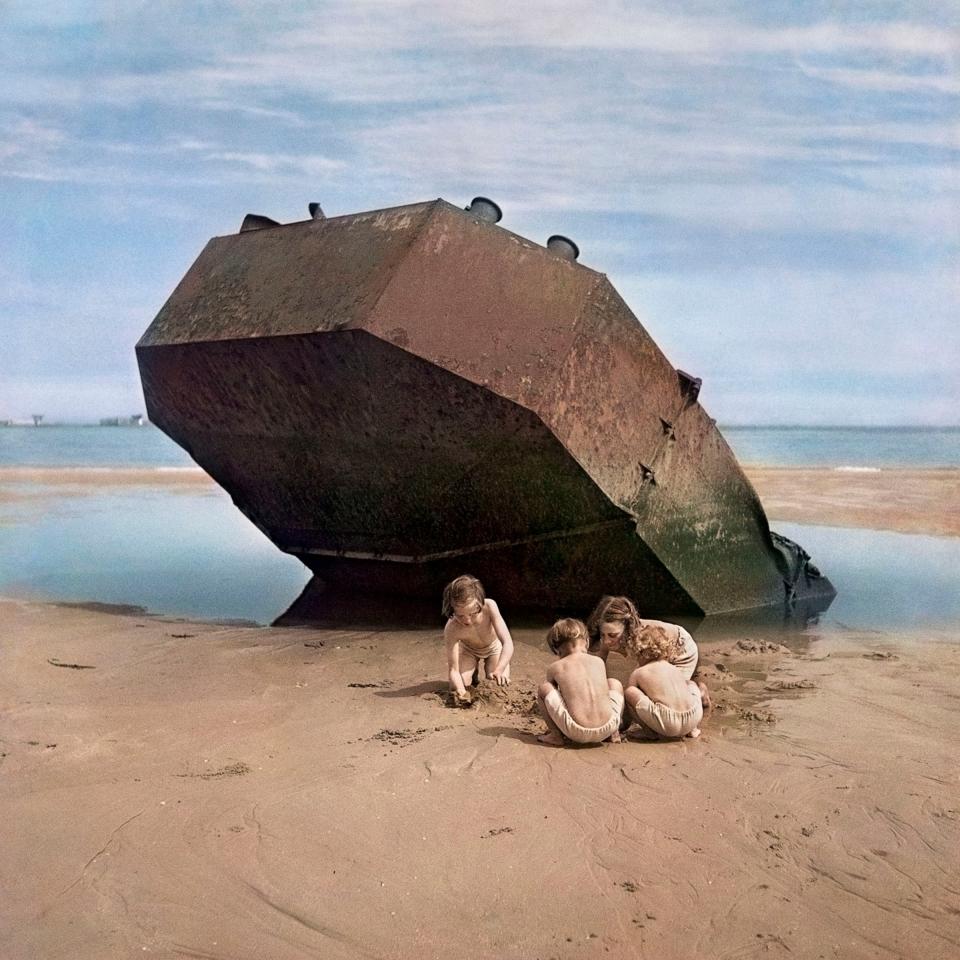 Children play among the wreckage of the D Day invasion is the result of David Seymour’s assignment for This Week magazine in 1947, in Normandy, exploring the aftermath for young people of years of conflict. He found kids playing imaginatively under an ominous, abandoned fortification.