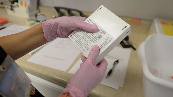 PHOTO: Away from volunteers participating in a new Lyme disease vaccine trial, registered nurse Janae Roland, prepares either the vaccine or a placebo at the Altoona Center for Clinical Research, Aug. 5, 2022, in Duncansville, Pa. (Gary M. Baranec/AP)