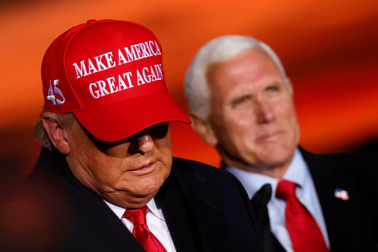 Then-President Donald Trump and then-Vice President Mike Pence attend a campaign rally at Cherry Capital Airport in Traverse City, Michigan, Nov. 2, 2020. (Reuters)