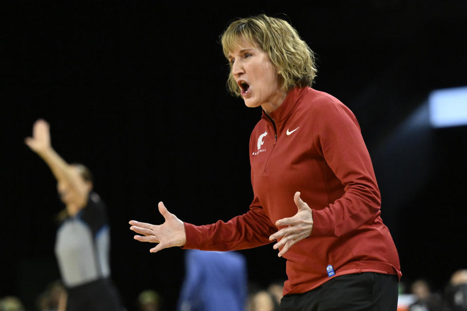 Washington State head coach Kamie Ethridge argues a call during the second half of an NCAA college basketball game against California in the first round of the Pac-12 women's tournament Wednesday, March 1, 2023, in Las Vegas. (AP Photo/David Becker)
